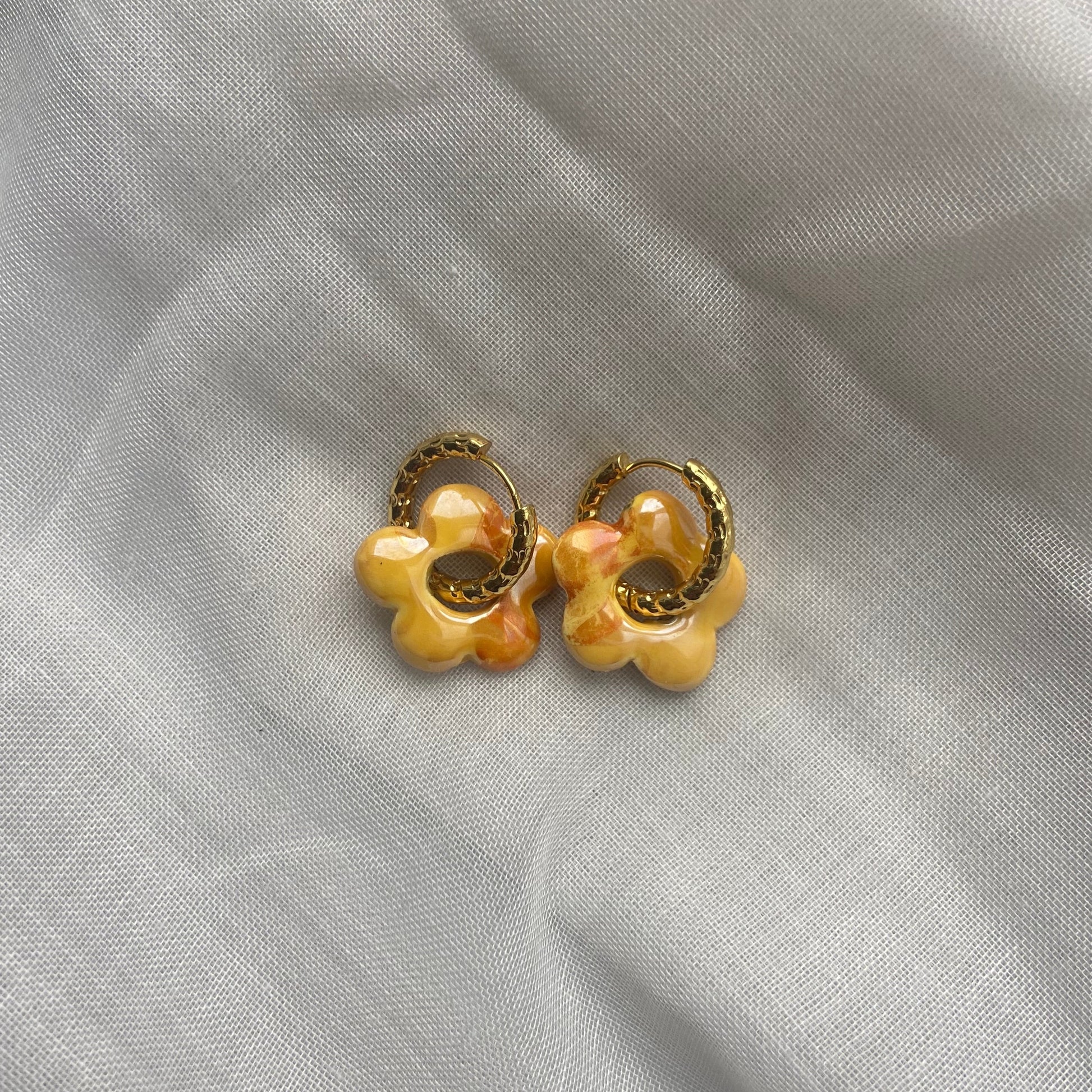 boucles d'oreilles forme fleur orange