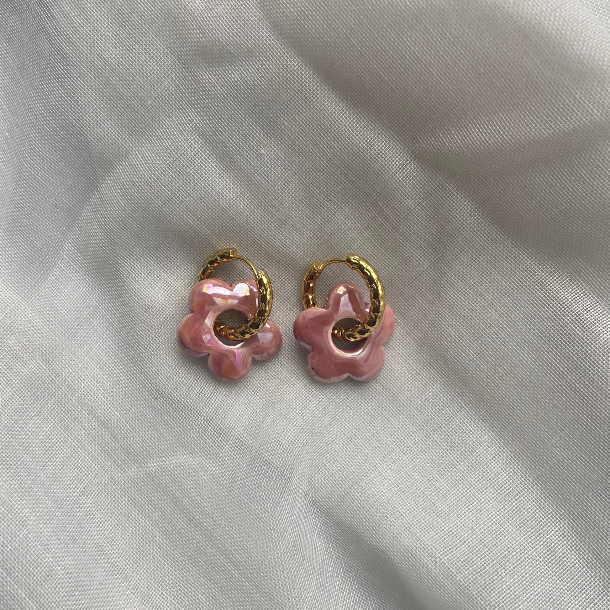 boucles d'oreilles forme fleur rose